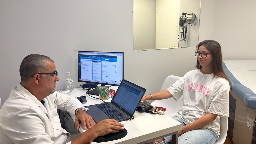 Patient receiving preventive care screening and wellness evaluation at MediCruz Medical Clinic in Tampa, Florida.
